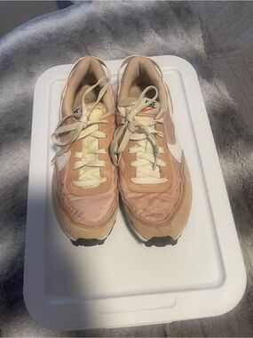 Nike Women’s Blush Pink and White Trail-Style Sneakers